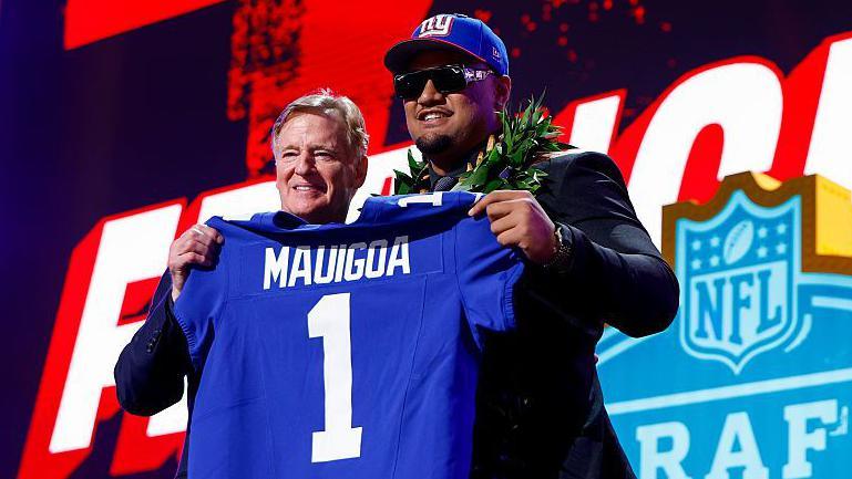 NFL commissioner Roger Goodell poses with Francis Mauigoa after the latter was selected in the 2026 NFL Draft