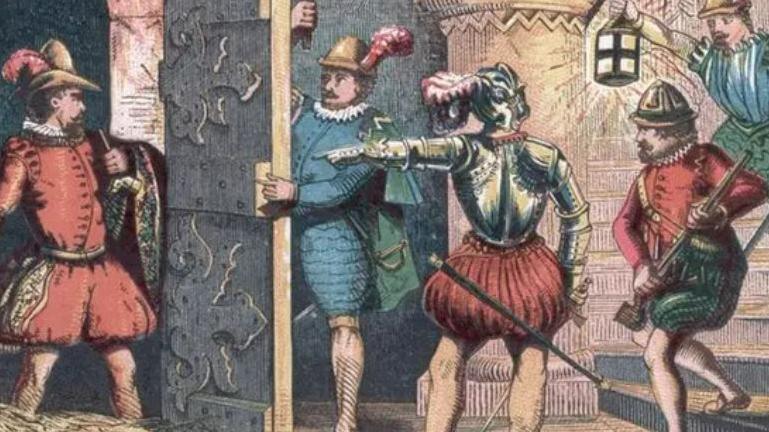 A woodblock animated image of five men in the basement area of the Houses of Parliament, four of whom are pointing at the representation of Guy Fawkes, who has apparently been discovered behind a heavy wooden door. Two of the other men are armed with weapons, with another holding a lantern.