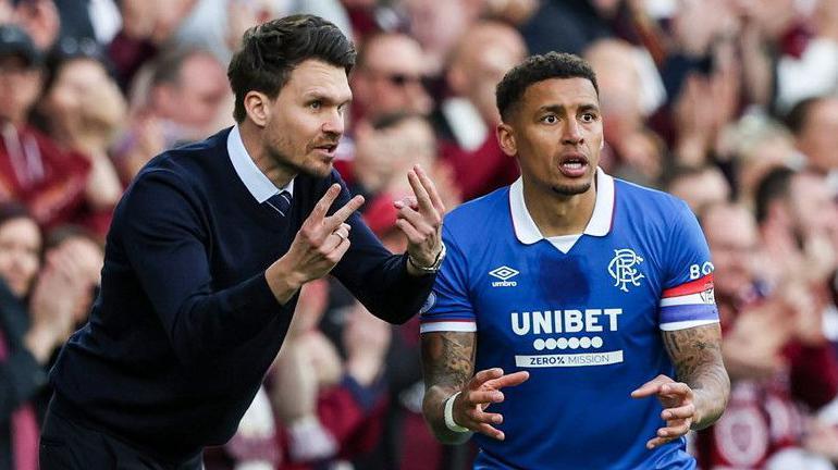 Rangers head coach Danny Rohl (L) and James Tavernier during a William Hill Premiership match between Heart of Midlothian and Rangers at Tynecastle Park, on May 04, 2026, in Edinburgh, Scotland