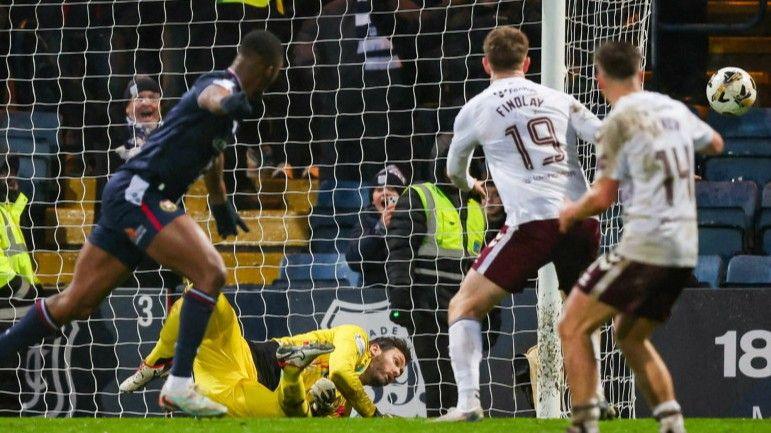 Emile Acquah (left) was already celebrating before Craig Gordon's save