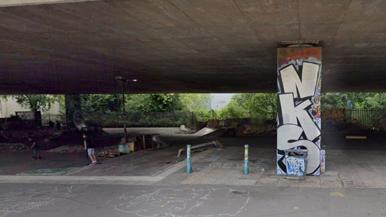 A Google Maps image of a skatepark, which is located in an underpass under the M32. There is graffiti on the concrete.