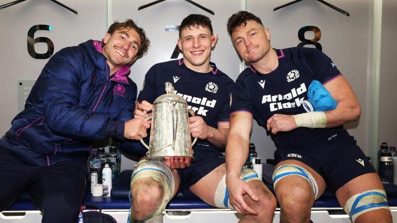 Scotland's Jamie Ritchie, Rory Darge and Jack Dempsey celebrate