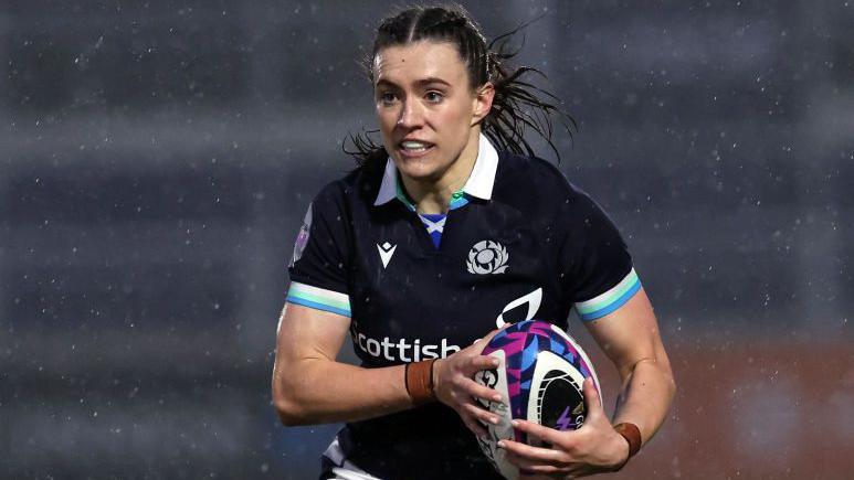 Francesca McGhie carries the ball for Scotland