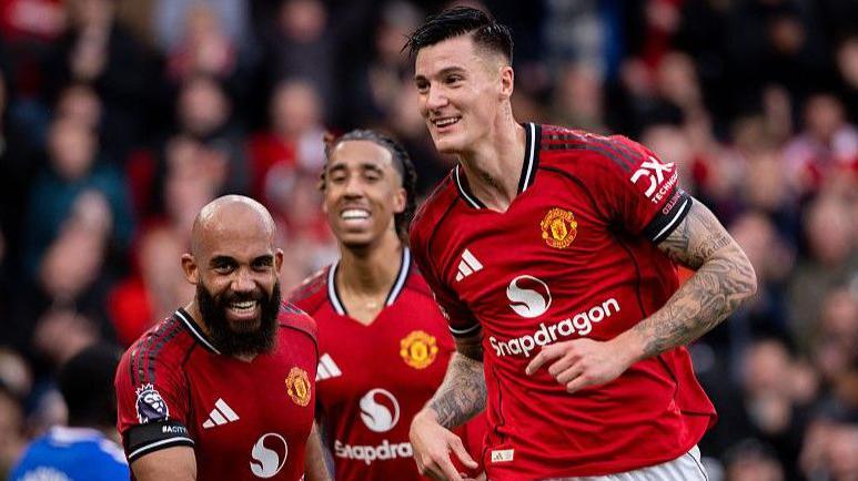 Manchester United striker Benjamin Sesko (right) celebrates his goal against Sunderland at Old Trafford