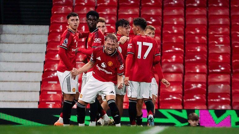 Manchester United academy players celebrate goal in International Cup match