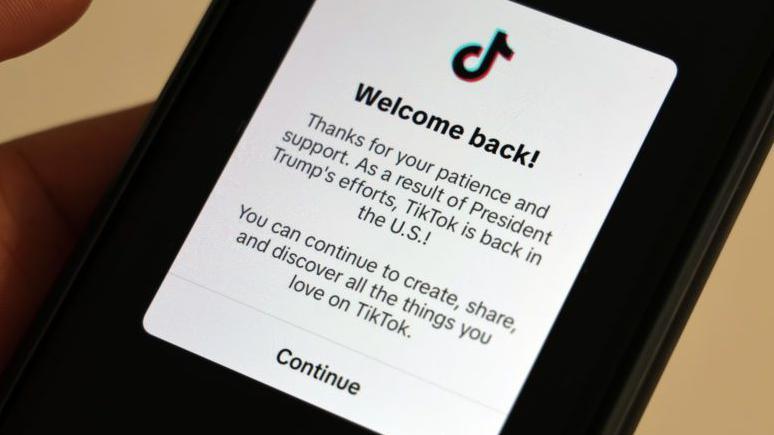 A note on the TikTok app which says: "Welcome back! Thanks for you patience and support. As a result of President Trump's efforts, TikTok is back in the US! You can continue to create, share, and discover all the things you love on TikTok."