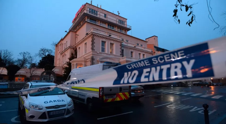 The hotel was cordoned off after the fatal gun attack 