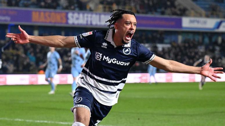 Calum Scanlon celebrates scoring for Millwall