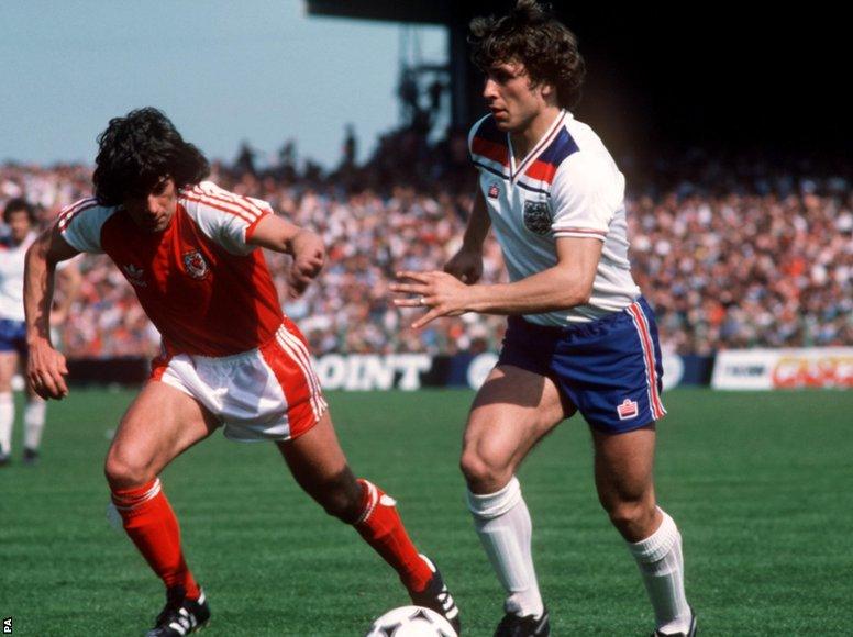 Wales beat England 4-1 with David Giles, seen here in action against Kenny Sansom, among the goalscorers.