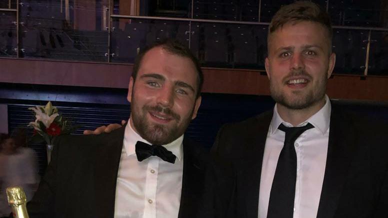 Fraser Balmain and Ed Slater in black tie at an awards show. 