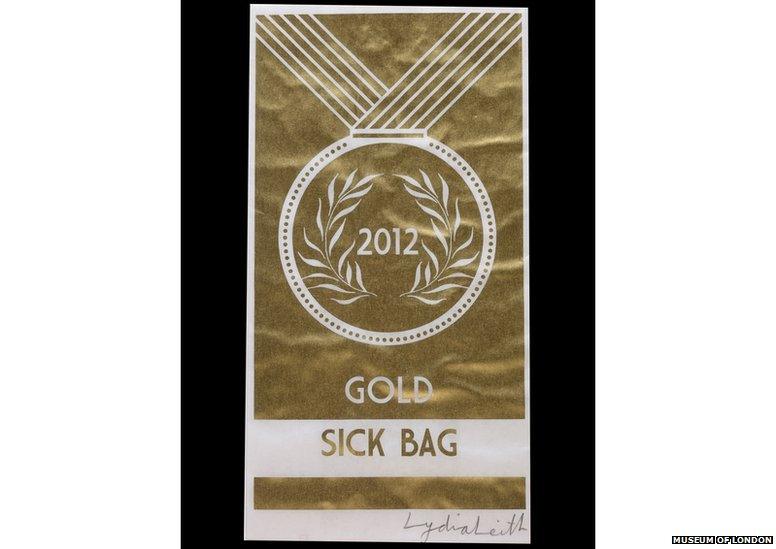 Gold sick back with Olympic logo on the side