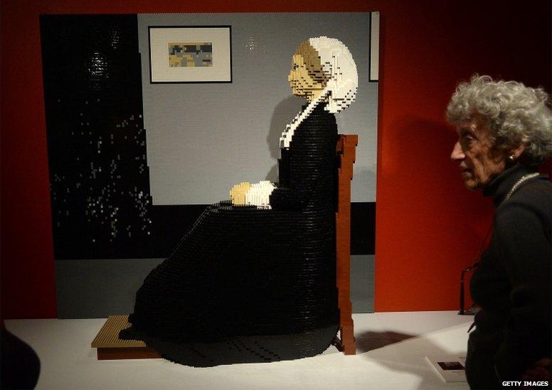 Lego sculpture based on a famous painting known as Whistler's Mother by American artist James Whistler.