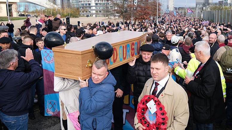 West Ham fans with a coffin