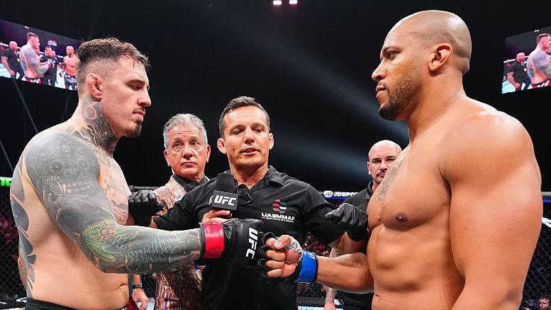 Tom Aspinall and Ciryl Gane touch gloves before their UFC fight in October 2025