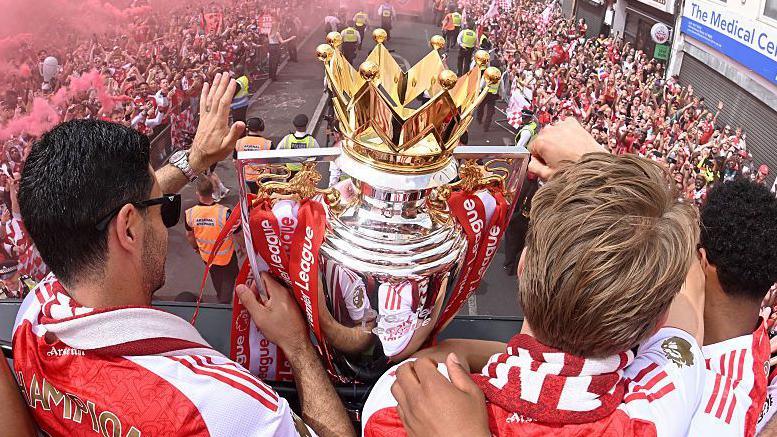 Arsenal show off the Premier League trophy