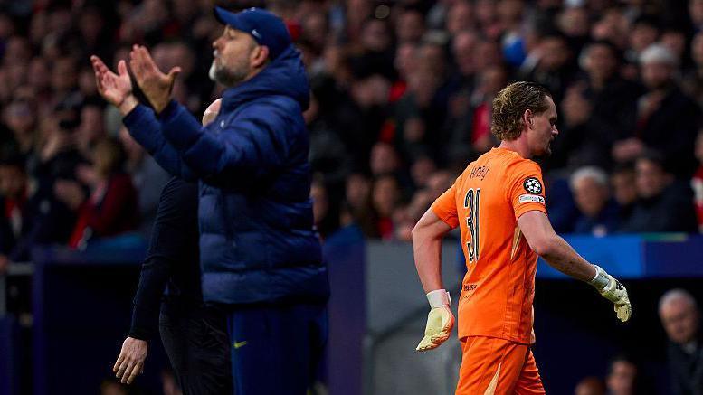 Goalkeeper Antonin Kinsky goes off the pitch in the 17th minute against Atletico Madrid 