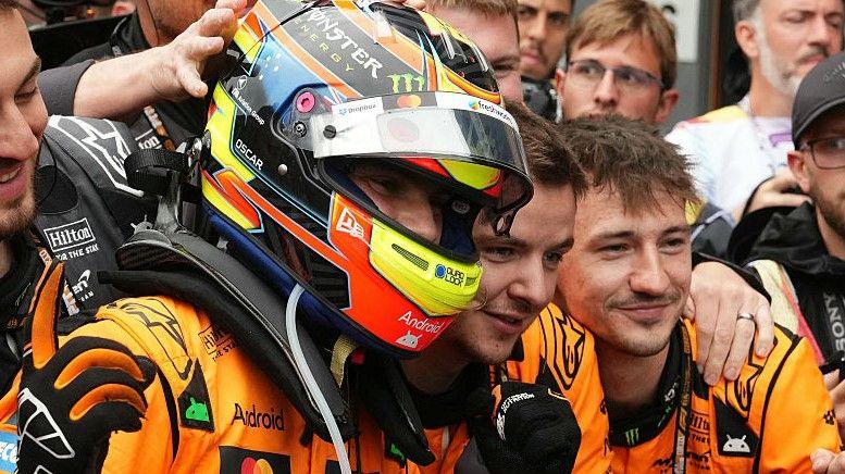 Oscar Piastri celebrates winning in Belgian with McLaren team-mates