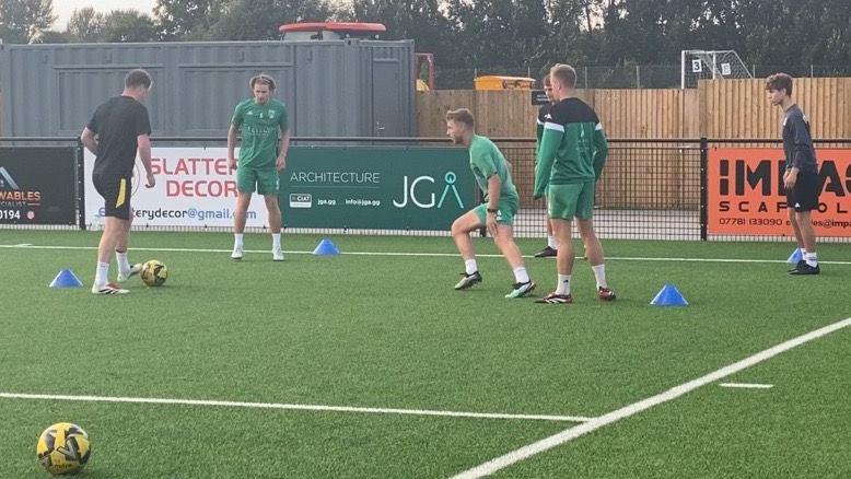 Guernsey FC players train