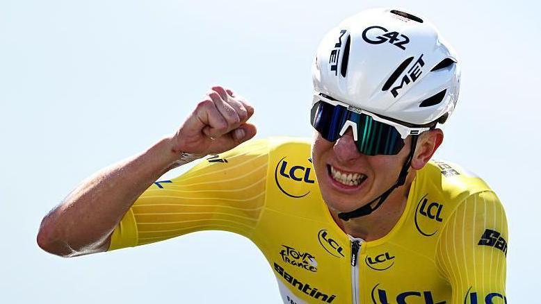Tadej Pogacar celebrates winning stage 13 of the 2025 Tour de France