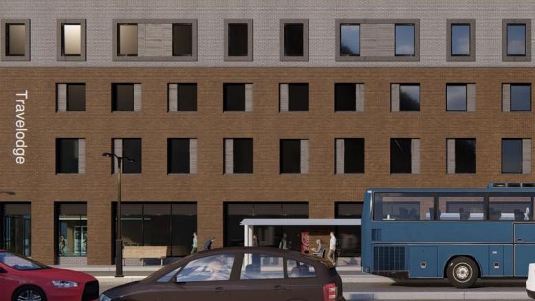 An artist's impression showing a frontal view of how a planned hotel will look. The top floor of four is white on the exterior. The bottom three floors are brown. The ground floor has larger windows. "Travelodge" is written in white on the left side of the building. A red car, a brown car and a green bus, plus a white bus station, stand in front of the hotel.