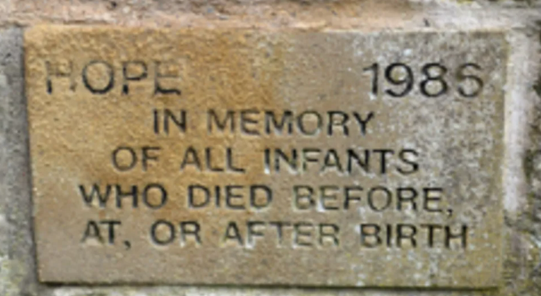 A plaque dedicated to stillborn babies marked hope