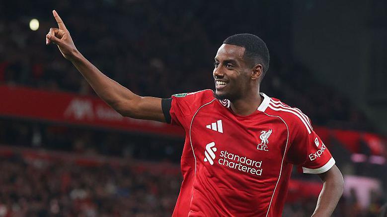 Alexander Isak celebrating scoring a goal for Liverpool.