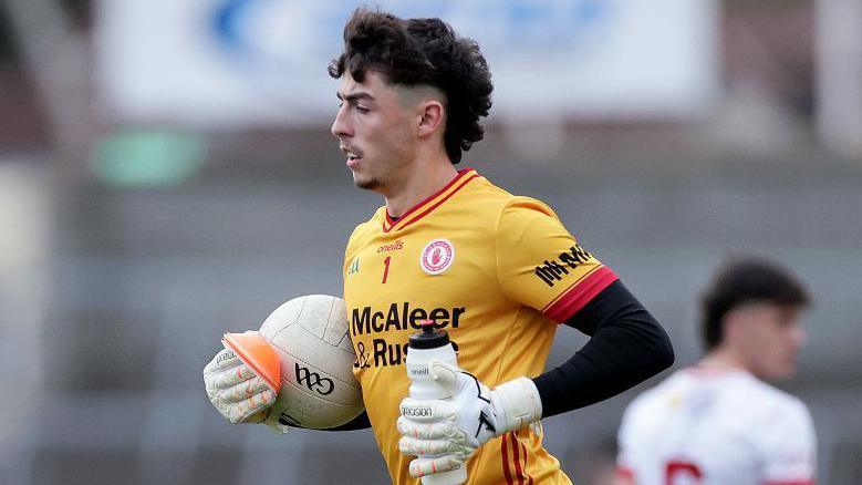 Conor McAneney with a ball in his hand