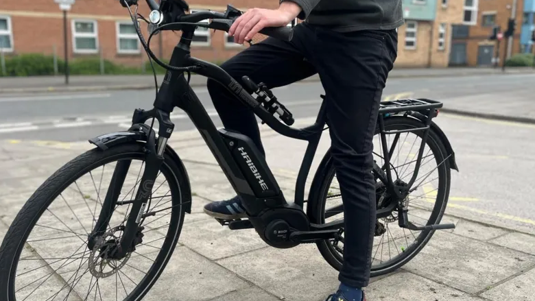 A man riding an e-bike