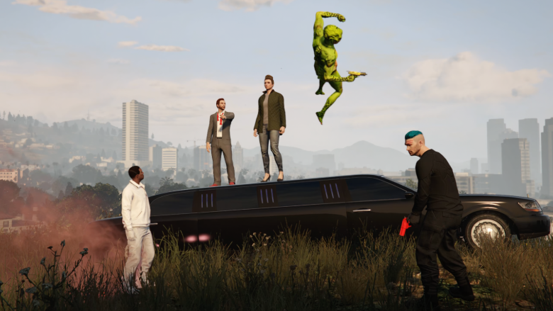 Cast members of GTA Hamlet captured mid-rehearsal, with some standing atop a limo and others holding guns