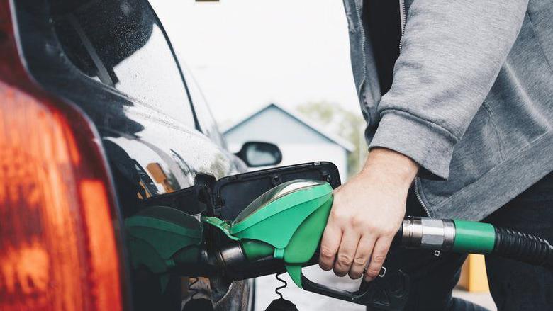 Man filling a car with petrol