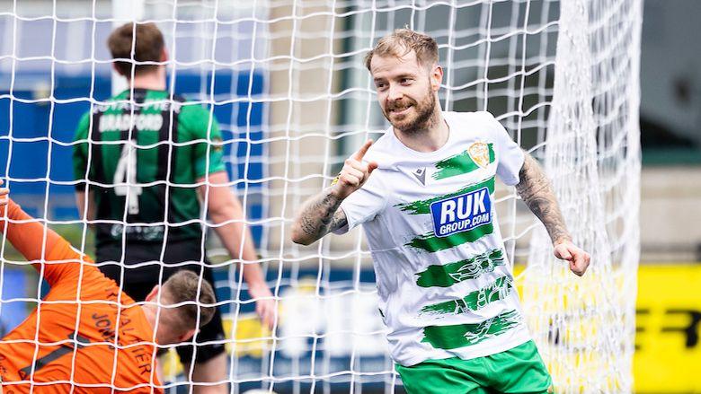 Ash Baker of The New Saints celebrates scoring 