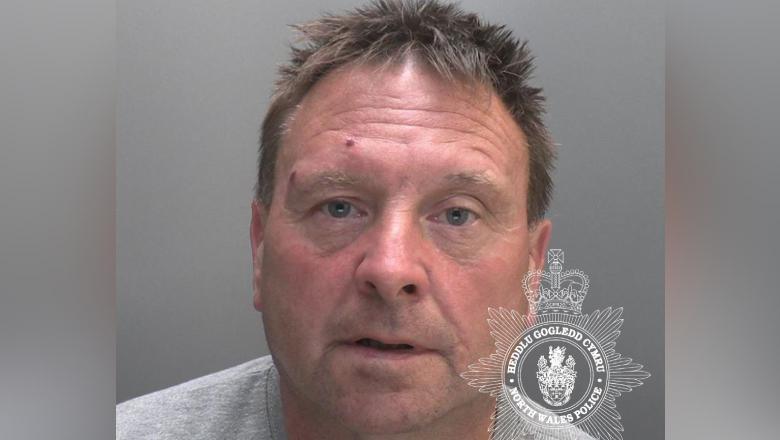 Colin Milburn, 52, was jailed after a jury found him guilty of beating Buddug Jones with a heavy weapon