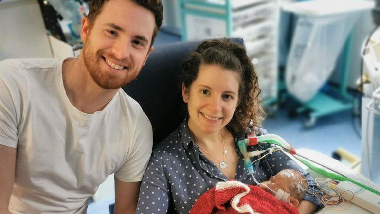 Bethan Wyn holding her premature daughter Mari Glyn in hospital