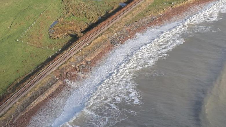 Damaged sea wall