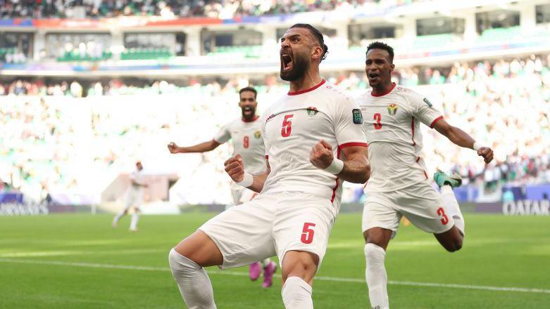 Yazan Al-Arab celebrates a goal during Jordan's Asian Cup match against South Korea in 2024