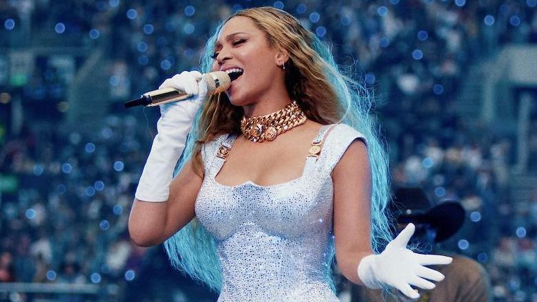 Beyoncé close-up in an all-white outfit
