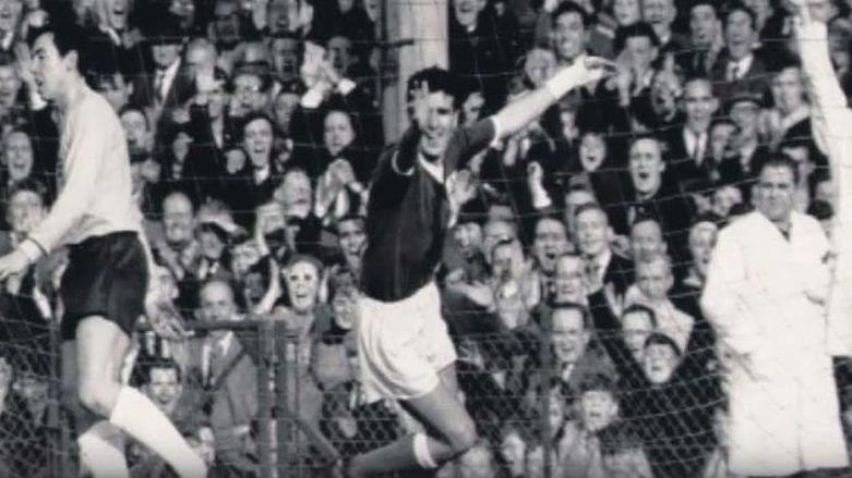 Northern Ireland football player Jim McLaughlin celebrates scoring a goal