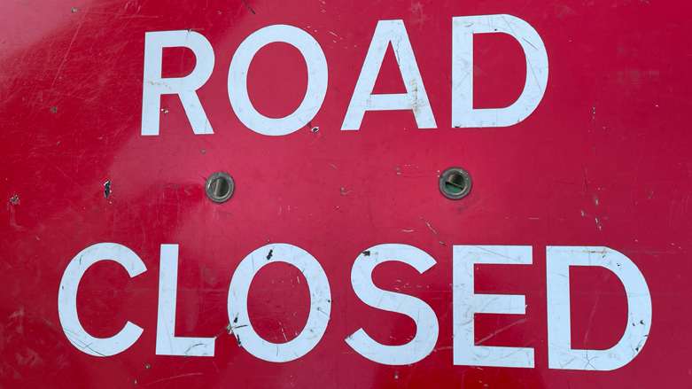 Sign reading 'Road Closed'