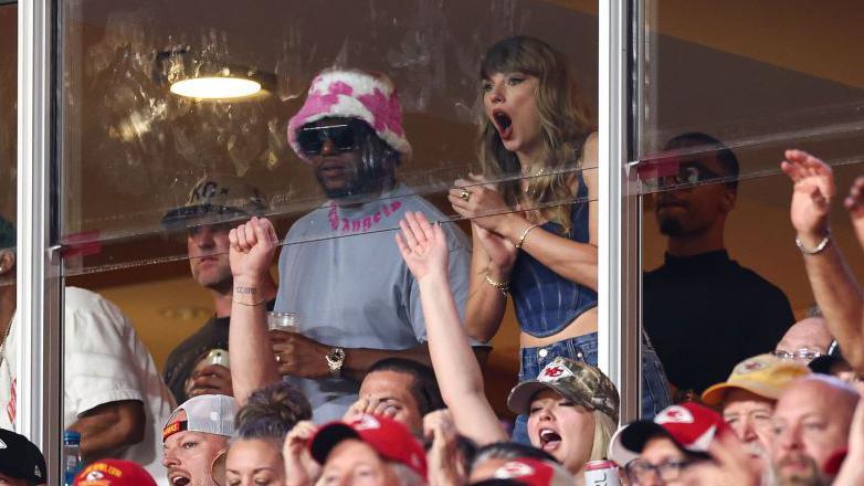 Taylor Swift looking excited while watching the Kansas City Chiefs beat the Baltimore Ravens