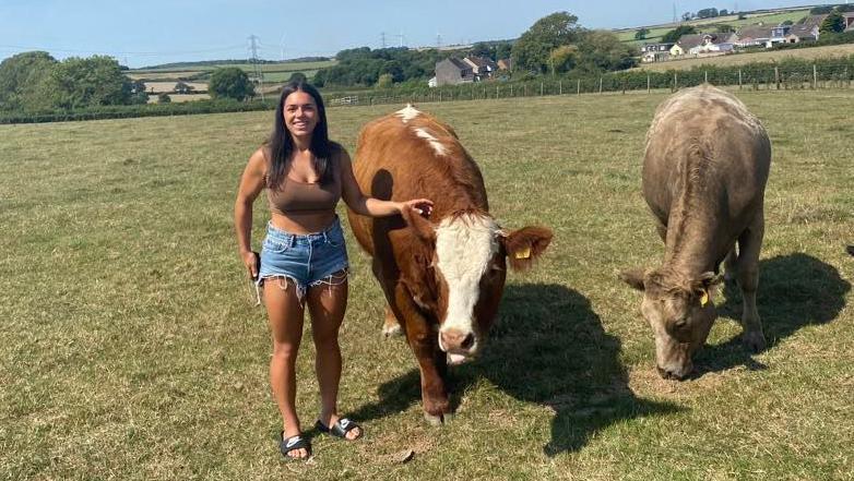 Girl with cows