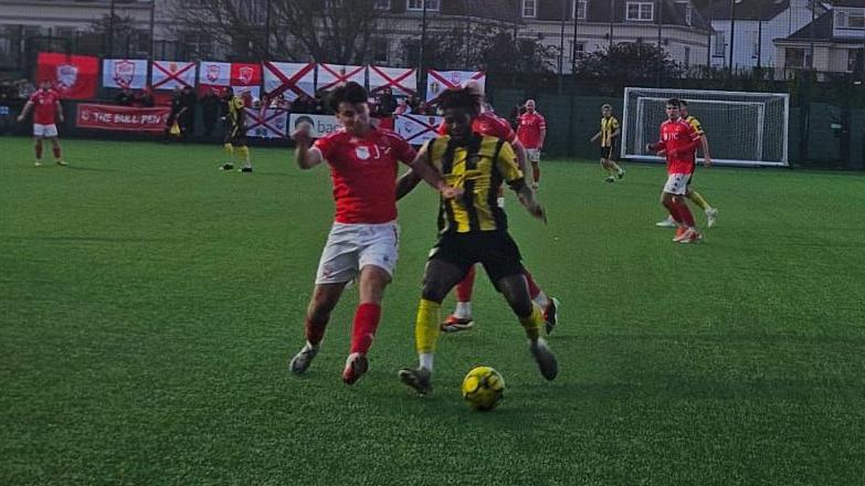 Action from Jersey Bulls v Erith Town