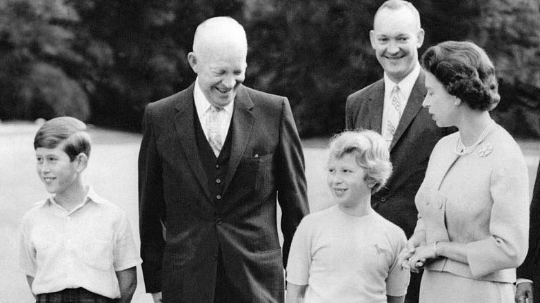 BALMORAL - 29th August 1959. President Dwight Eisenhower (left) and his son Major John Eisenhower on the lawn of Balmoral with Queen Elizabeth and her children Prince Charles and Princess Anne.