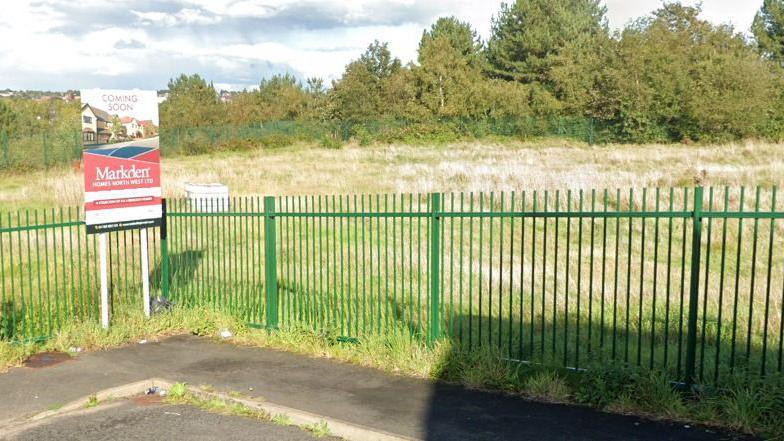 A fenced off area of land in Wolstanton, Newcastle-under-Lyme