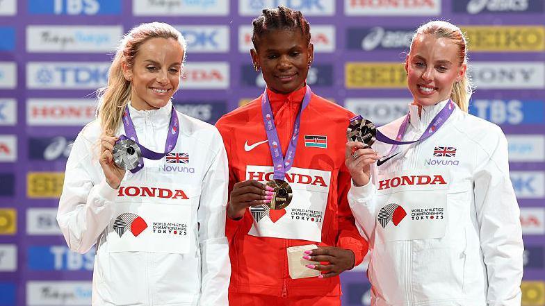 Georgia Hunter Bell (left), Lilian Odira (centre) and Keely Hodgkinson (right) hold up their medals