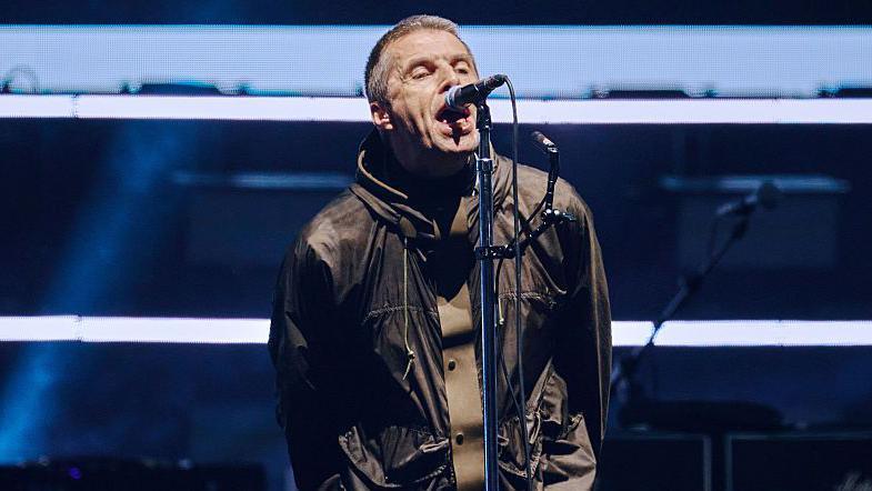 Liam Gallagher of Oasis performs on stage during the opening night of their Live '25 Tour at Principality Stadium on July 04, 2025 in Cardiff, Wales