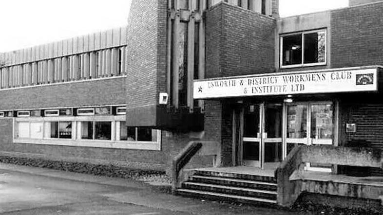 A black and white picture of Usworth Top Club, which is a classic example of 1960s brutalist architecture.