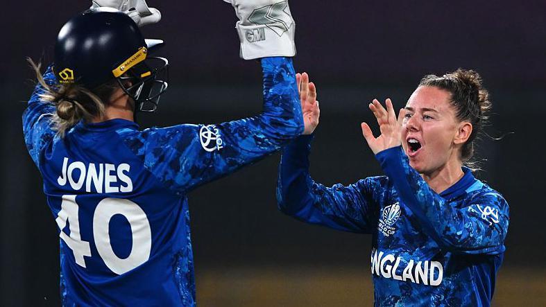 Linsey Smith of England celebrates taking an Australia wicket with team-mate Amy Jones