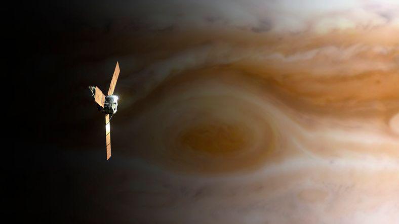 An illustration of Nasa's Juno spacecraft above Jupiter's Great Red Spot.