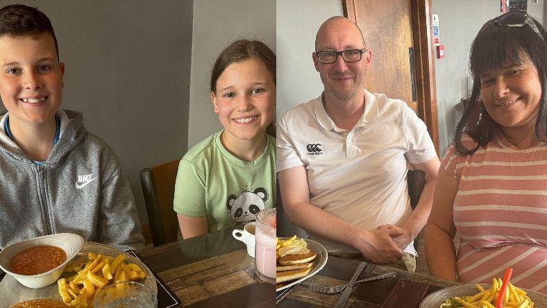 Collage: left boy and girl sat at woodened laminate table with chips and beans on white plate in front. Right man and woman at same table with tableware and food in front of them. 