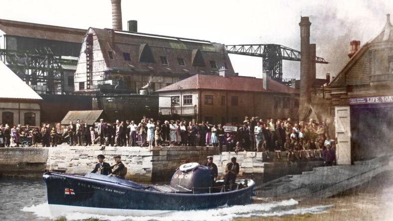 Poole lifeboat Thomas Kirk Wright being launched down the slipway at the old Poole lifeboat station, now a museum.